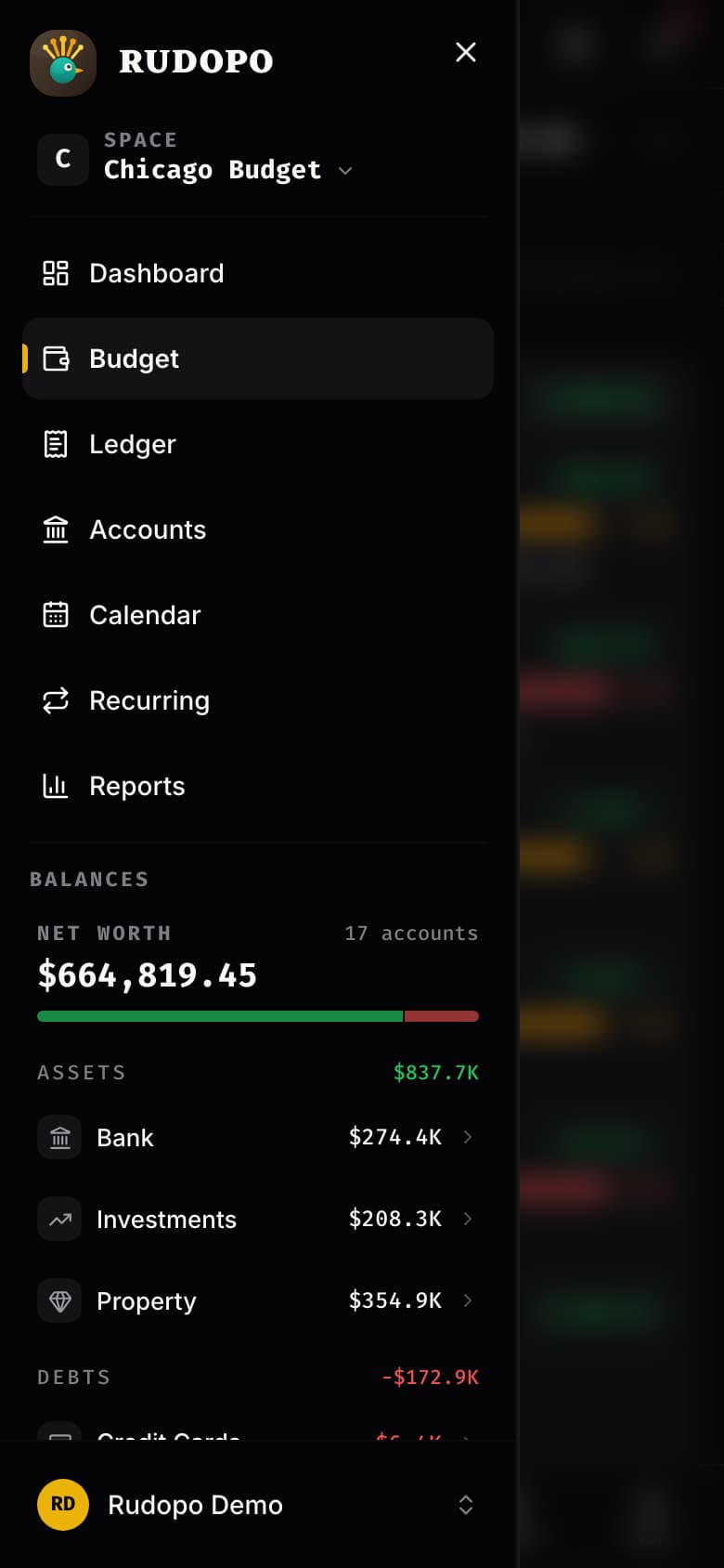 The More menu open on a phone, in the dark Raven theme: the space switcher, the full navigation list, a balances summary, and the user row at the foot of the drawer.